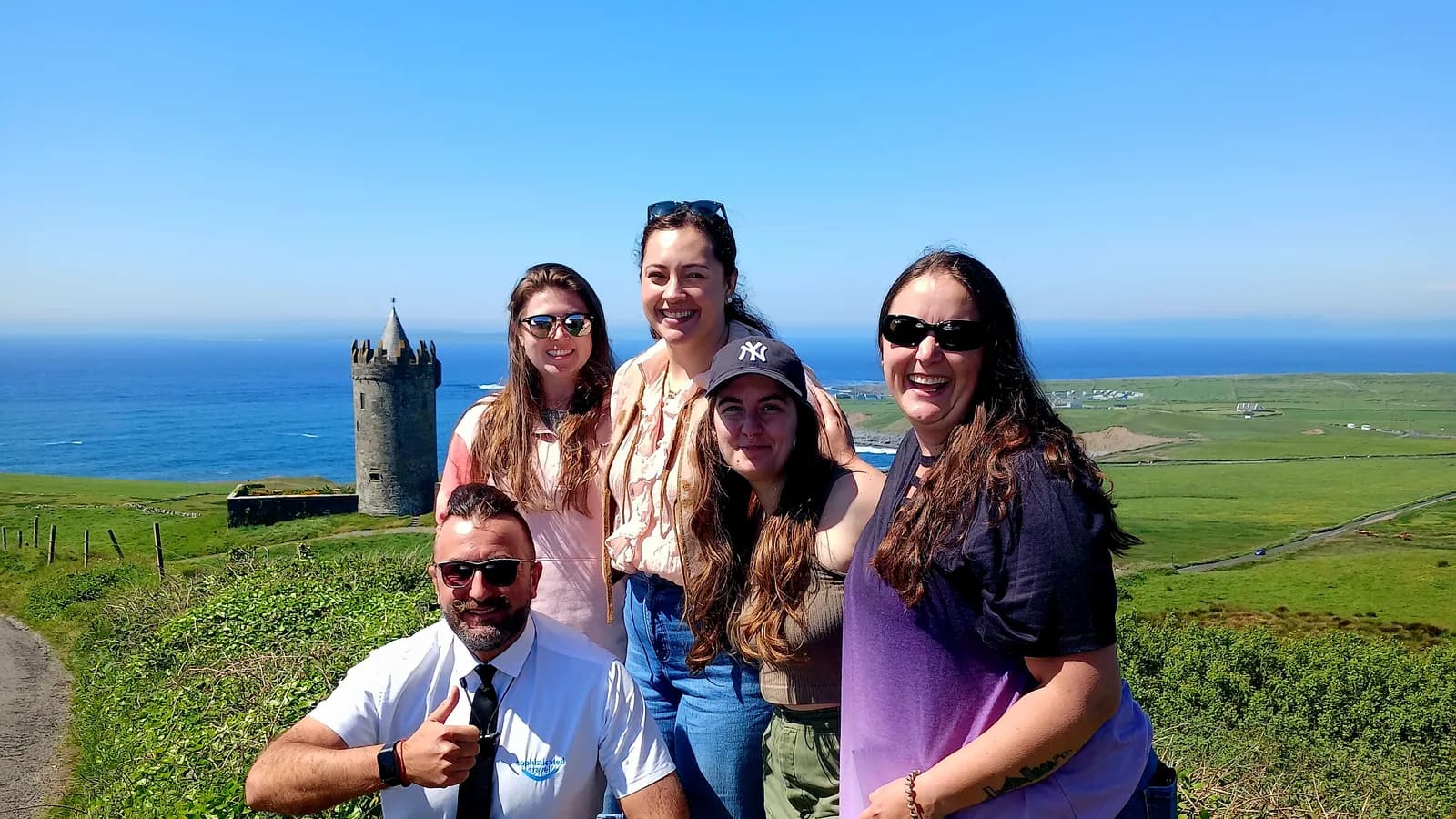 Guests at the Cliffs of Moher on a private chauffeur tour