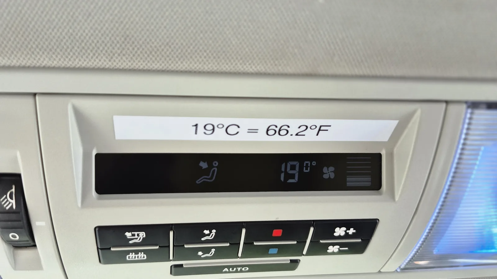 Climate control display inside the van showing the cabin temperature