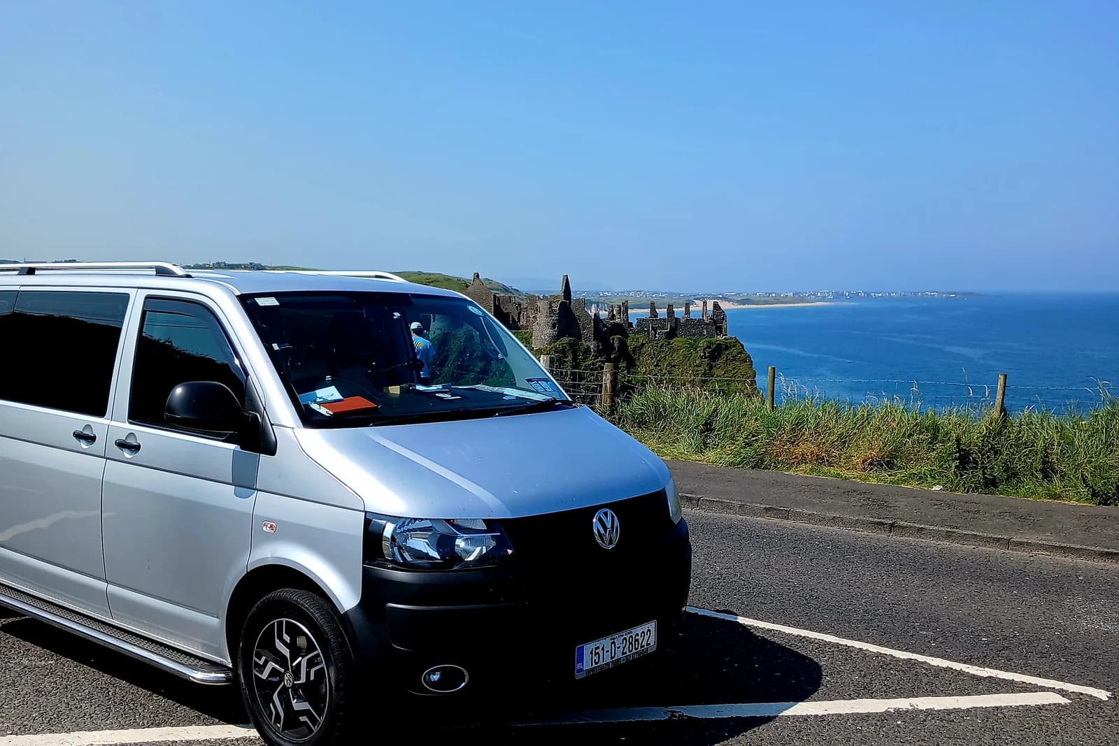 Private transfer vehicle on a west-of-Ireland coastal road between Athlone and Galway